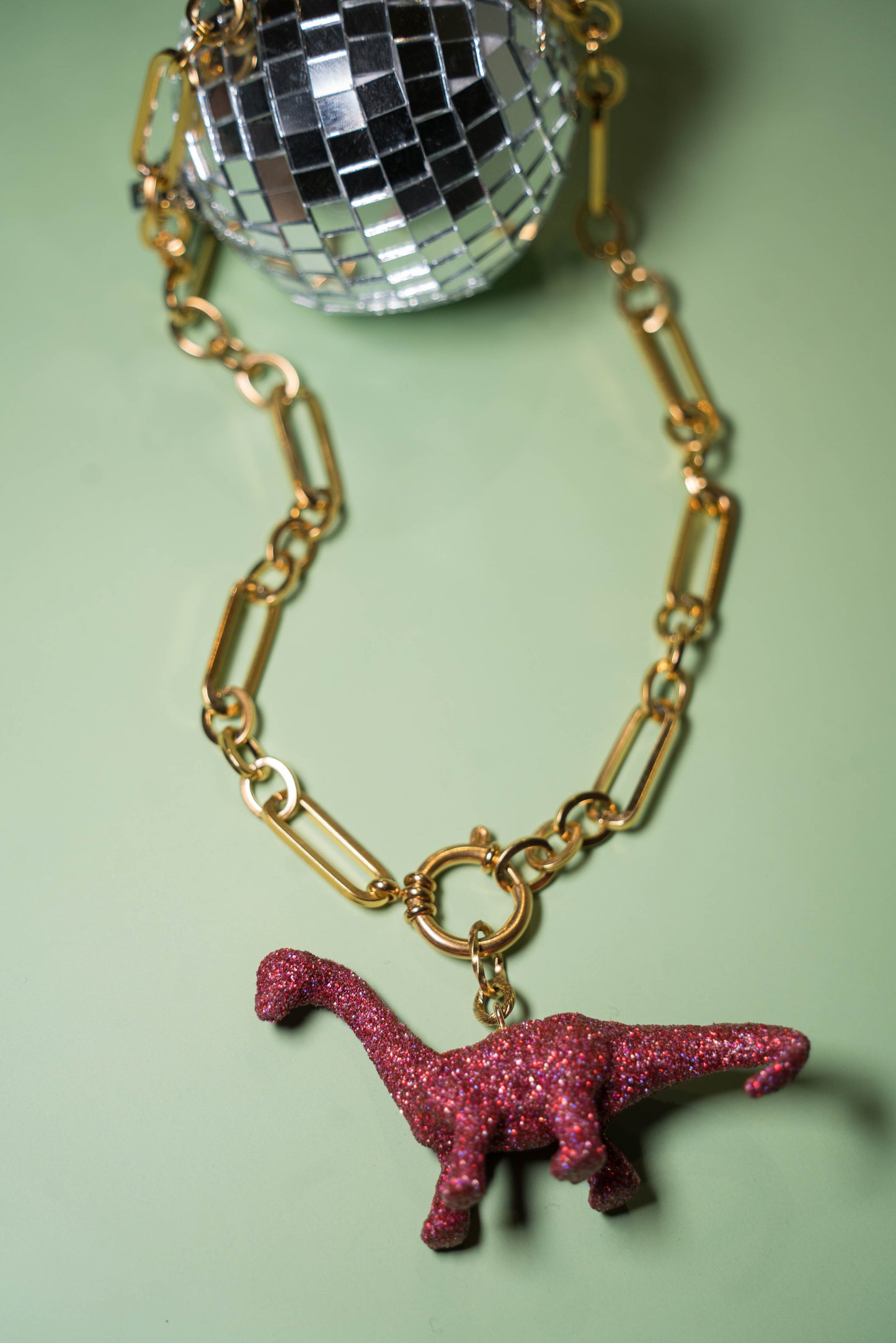 Pendentif DINOSAURE ROSE