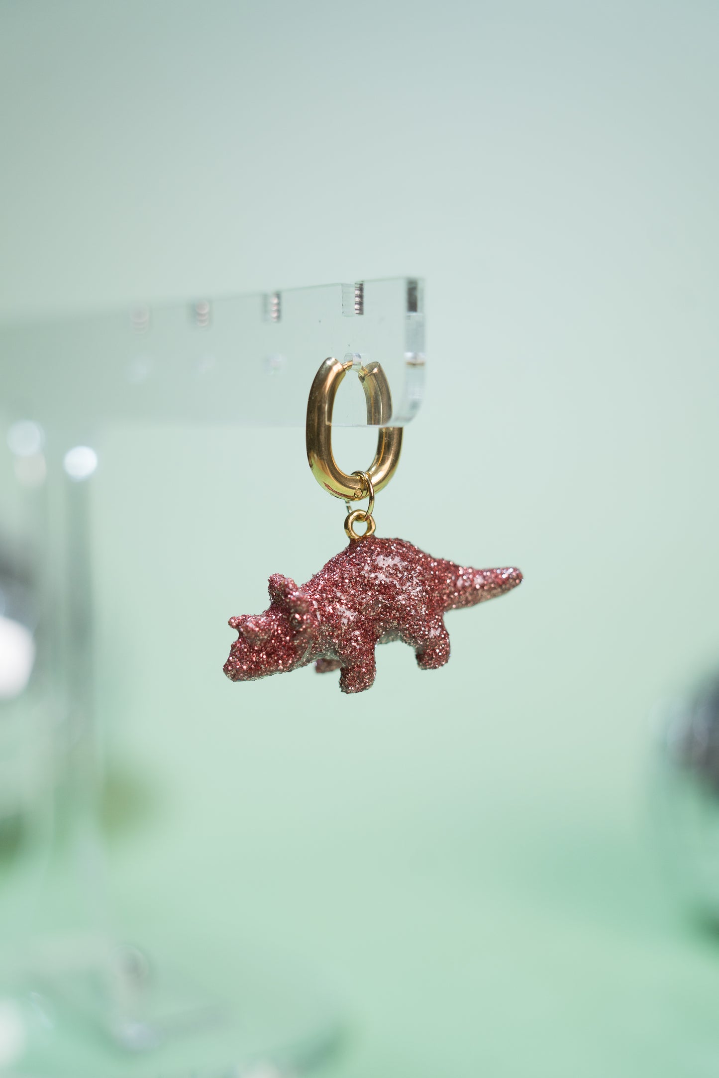 Mono boucle - Mini dinosaure paillettes roses (Triceratops)