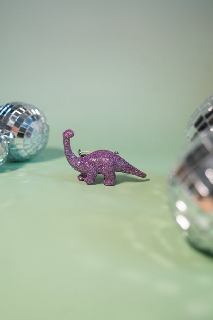 Broche Dinosaure paillettes lilas (Diplodocus)