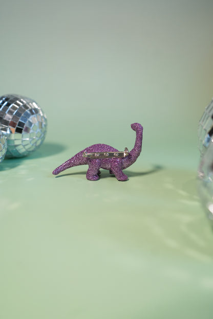 Broche Dinosaure paillettes lilas (Diplodocus)