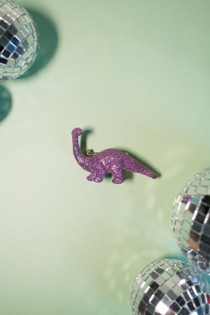 Broche Dinosaure paillettes lilas (Diplodocus)