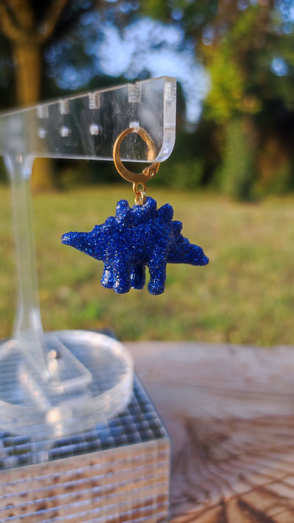 Mono boucle  - Mini dinosaure paillettes bleues (Stegosaure)