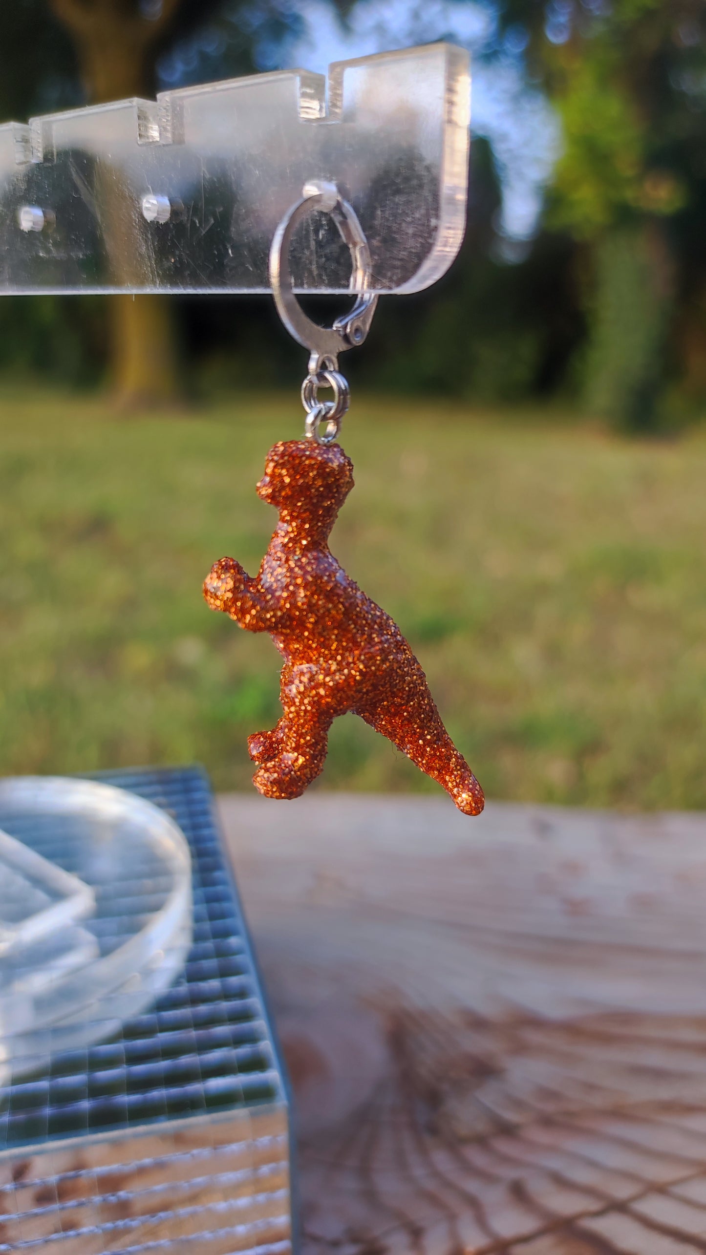 Mono boucle  - Mini dinosaure paillettes oranges (T-rex)