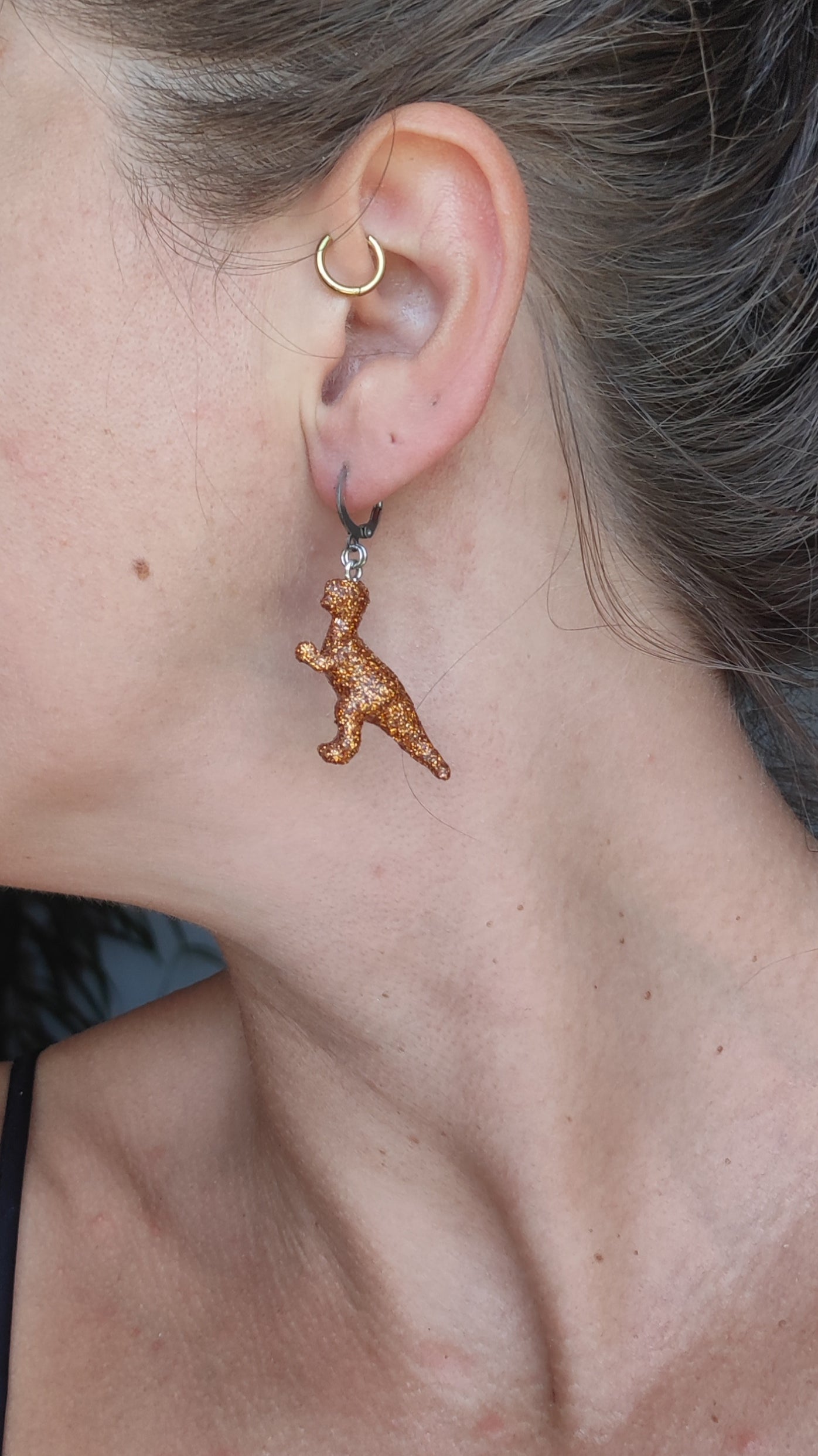 Mono boucle  - Mini dinosaure paillettes oranges (T-rex)