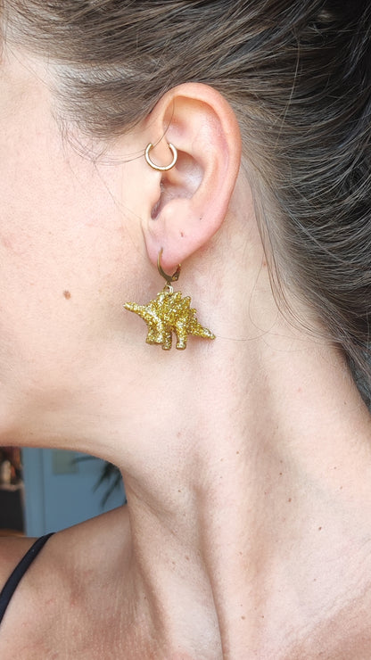 Mono boucle  - Mini dinosaure paillettes dorées (Stegosaure)