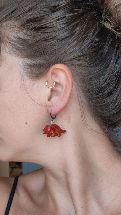Mono boucle  - Mini dinosaure paillettes rouges (Triceratops)