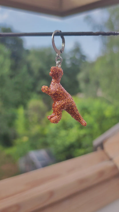 Mono boucle  - Mini dinosaure paillettes oranges (T-rex)