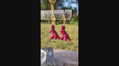 Mono boucle  - Mini dinosaure paillettes roses fuchsia (T-rex)